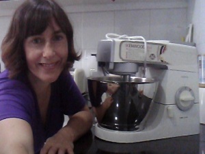 elaine posing in kitchen with mixer